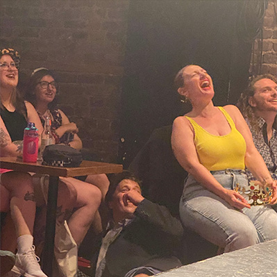 Audience laughing at the show